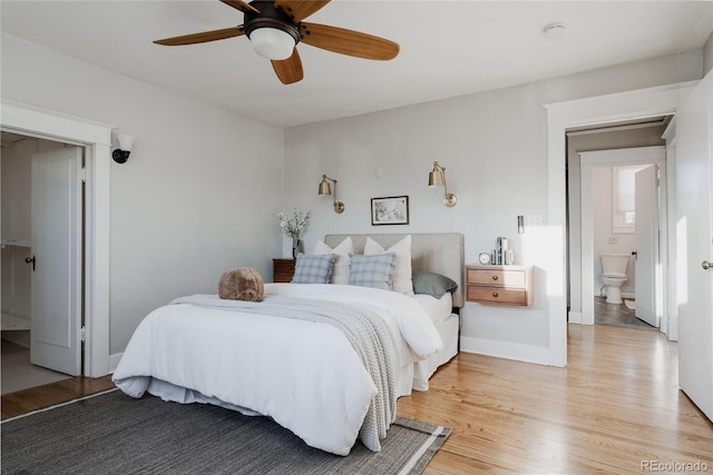 2096 S Logan St, Denver, CO 80210 - bedroom featuring light wood-style flooring and a ceiling fan