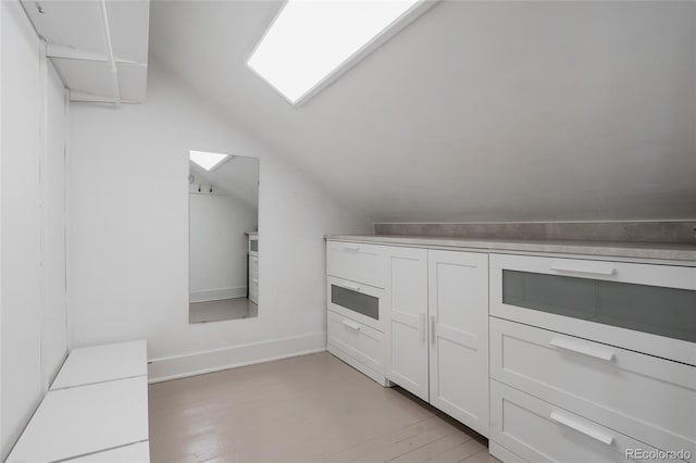 2096 S Logan St, Denver, CO 80210 - additional living space with vaulted ceiling
