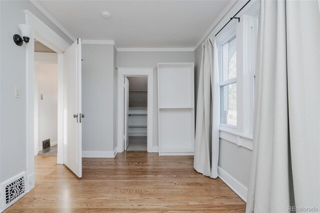 2096 S Logan St, Denver, CO 80210 - spacious closet with light wood finished floors