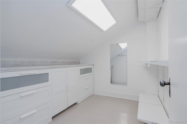 2096 S Logan St, Denver, CO 80210 - bathroom with vaulted ceiling and baseboards