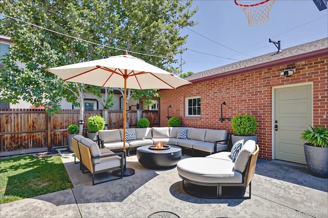 2096 S Logan St, Denver, CO 80210 - view of patio / terrace with an outdoor living space with a fire pit