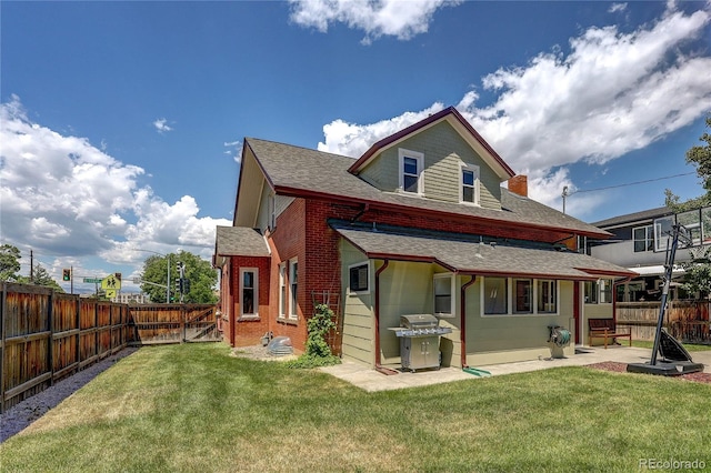 2096 S Logan St, Denver, CO 80210 - back of property with roof with shingles, a patio area, a fenced backyard, and a gate