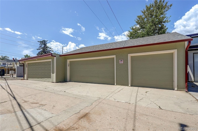2096 S Logan St, Denver, CO 80210 - garage featuring concrete driveway