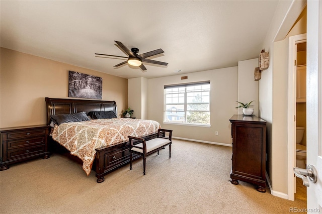 bedroom featuring ceiling fan and light carpet