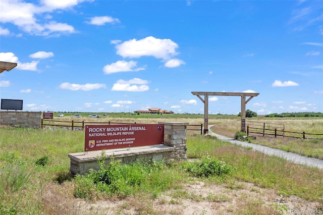 exterior space featuring a rural view and fence