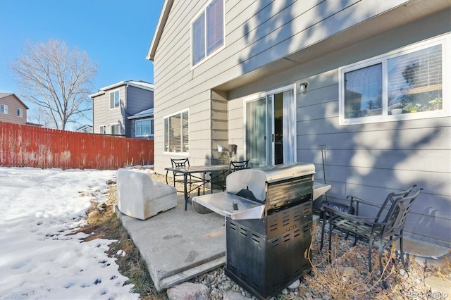 view of snow covered patio