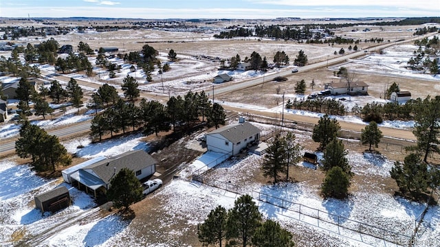 snowy aerial view with a rural view