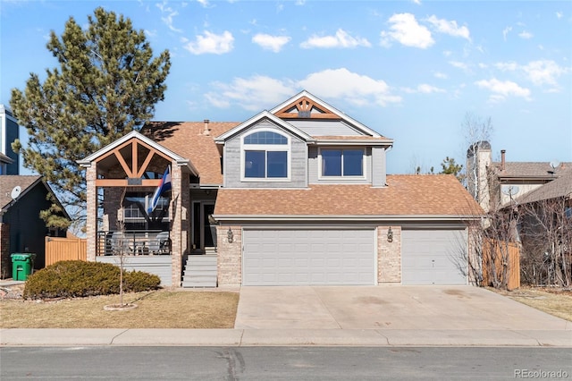 view of front of property featuring a shingled roof, brick siding, driveway, and fence