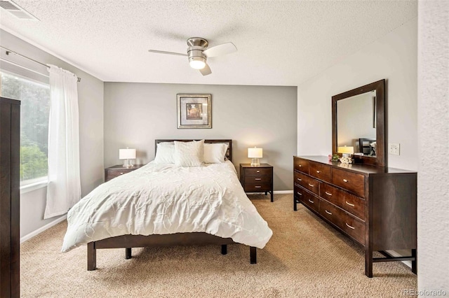 2476 S Gibralter Way, Aurora, CO 80013 - bedroom featuring light carpet, a textured ceiling, and ceiling fan