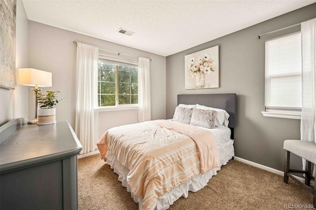 2476 S Gibralter Way, Aurora, CO 80013 - carpeted bedroom with a textured ceiling and baseboards