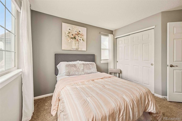 2476 S Gibralter Way, Aurora, CO 80013 - carpeted bedroom featuring baseboards and a closet