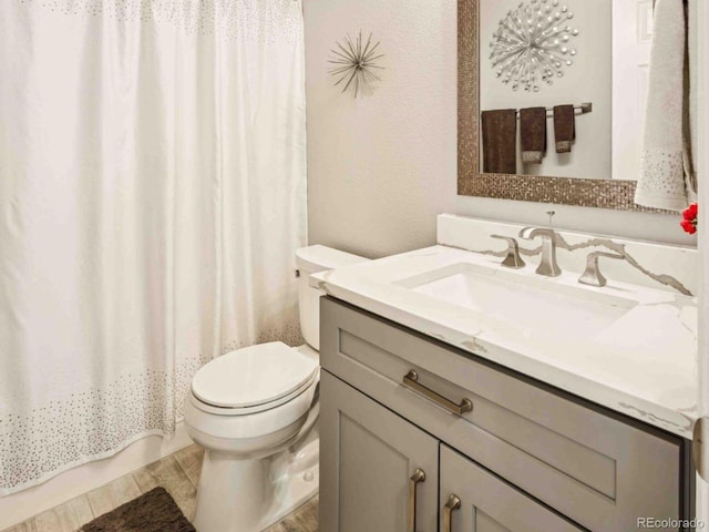 2476 S Gibralter Way, Aurora, CO 80013 - full bathroom featuring vanity and toilet