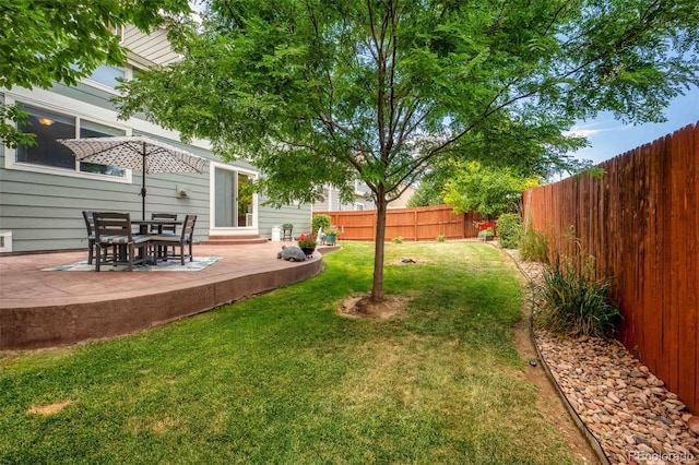 2476 S Gibralter Way, Aurora, CO 80013 - fenced backyard with a patio
