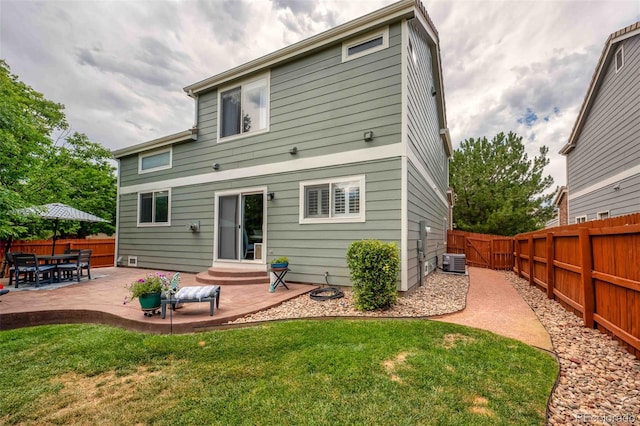 2476 S Gibralter Way, Aurora, CO 80013 - rear view of property with a fenced backyard, a patio area, and entry steps