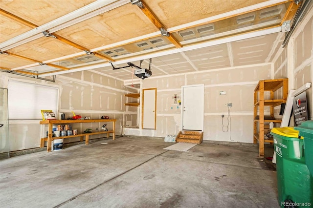 2476 S Gibralter Way, Aurora, CO 80013 - garage featuring a garage door opener