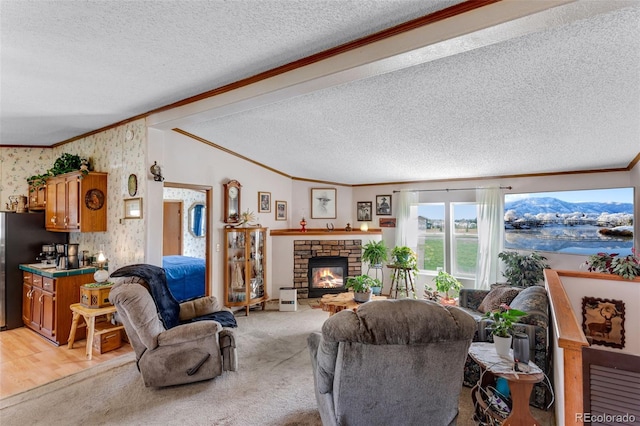 6310 W County Road 4, Berthoud, CO 80513 - living area featuring crown molding, a textured ceiling, vaulted ceiling, a glass covered fireplace, and light colored carpet