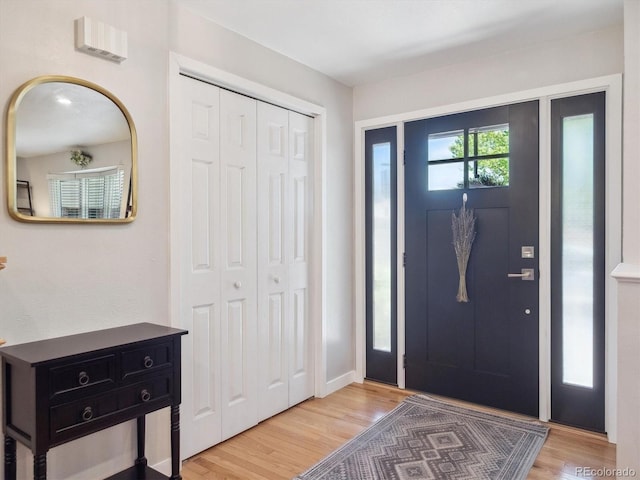 7379 S Lafayette Cir W, Centennial, CO 80122 - entryway featuring light wood finished floors and baseboards