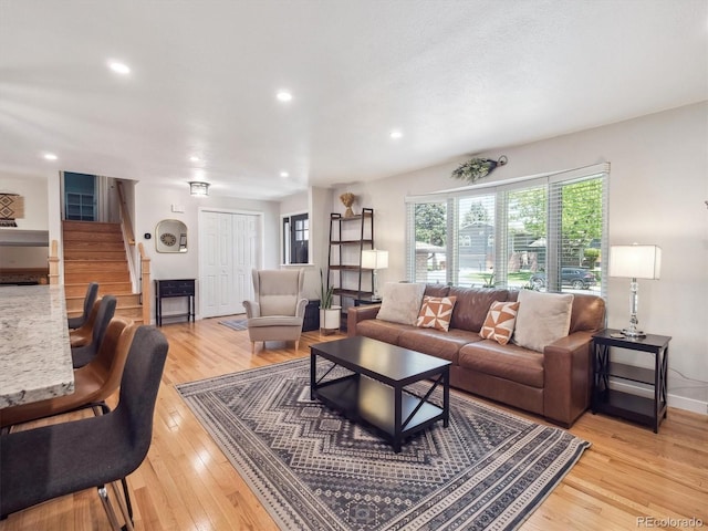 7379 S Lafayette Cir W, Centennial, CO 80122 - living room featuring stairs, light wood-style flooring, and recessed lighting