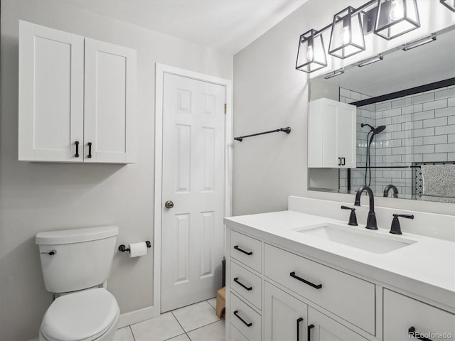 7379 S Lafayette Cir W, Centennial, CO 80122 - full bath with vanity, toilet, tile patterned flooring, tiled shower, and baseboards