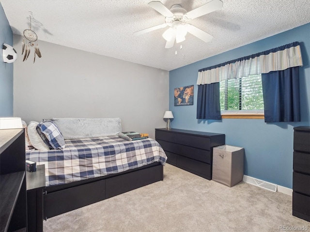 7379 S Lafayette Cir W, Centennial, CO 80122 - carpeted bedroom featuring a textured ceiling, ceiling fan, and baseboards