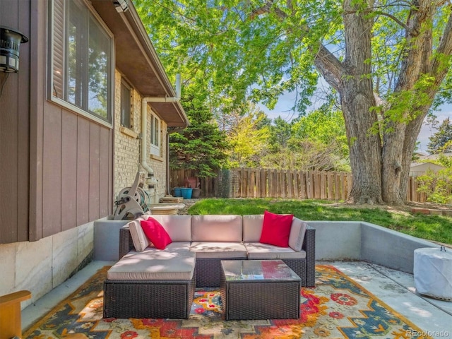 7379 S Lafayette Cir W, Centennial, CO 80122 - fenced backyard featuring an outdoor hangout area and a patio