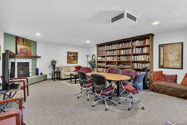 31270 John Wallace Rd Unit 302, Evergreen, CO 80439 - office space featuring carpet flooring, recessed lighting, and a tile fireplace