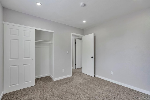 3575 S Ouray St, Aurora, CO 80013 - unfurnished bedroom with carpet, baseboards, recessed lighting, and a closet