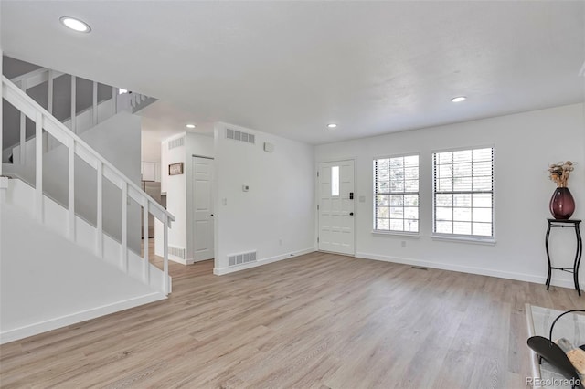3575 S Ouray St, Aurora, CO 80013 - entryway featuring stairway, recessed lighting, wood finished floors, and baseboards
