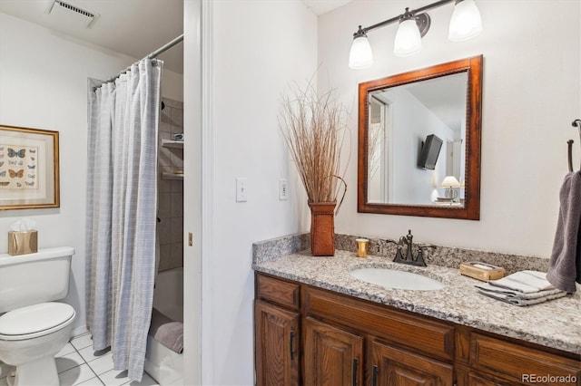 2437 E Geddes Pl, Centennial, CO 80122 - full bath with vanity, toilet, tile patterned floors, and shower / bath combo