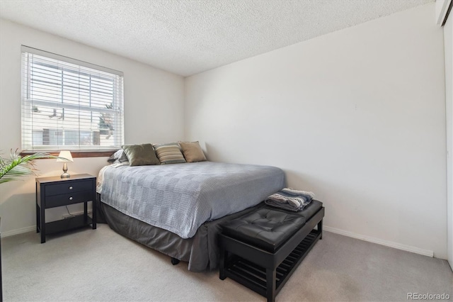 2437 E Geddes Pl, Centennial, CO 80122 - bedroom with light colored carpet, baseboards, and a textured ceiling