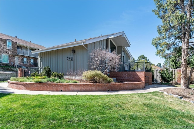 2437 E Geddes Pl, Centennial, CO 80122 - view of front facade featuring board and batten siding
