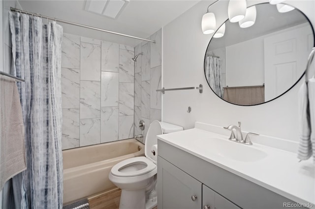 full bathroom featuring hardwood / wood-style floors, vanity, toilet, and shower / tub combo with curtain