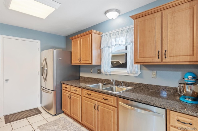 4929 Witches Hollow Ln, Colorado Springs, CO 80911 - kitchen with stainless steel appliances and light tile patterned floors