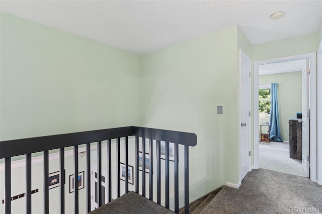 4929 Witches Hollow Ln, Colorado Springs, CO 80911 - hallway featuring an upstairs landing and carpet flooring