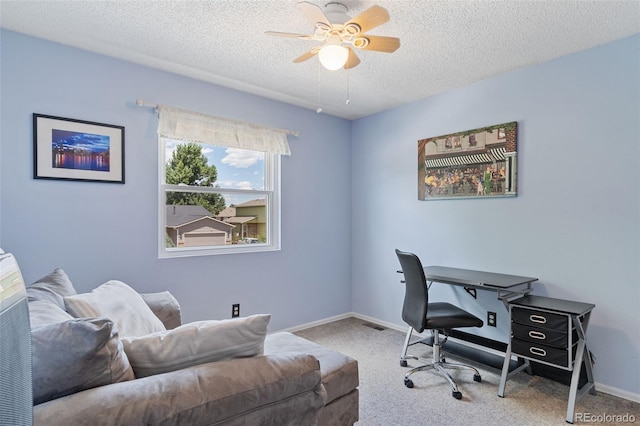 4929 Witches Hollow Ln, Colorado Springs, CO 80911 - carpeted home office with a textured ceiling and a ceiling fan