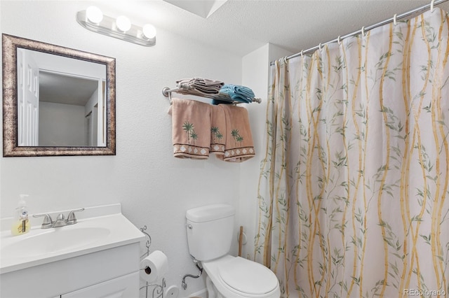 4929 Witches Hollow Ln, Colorado Springs, CO 80911 - full bathroom with vanity, a textured ceiling, and a shower with curtain