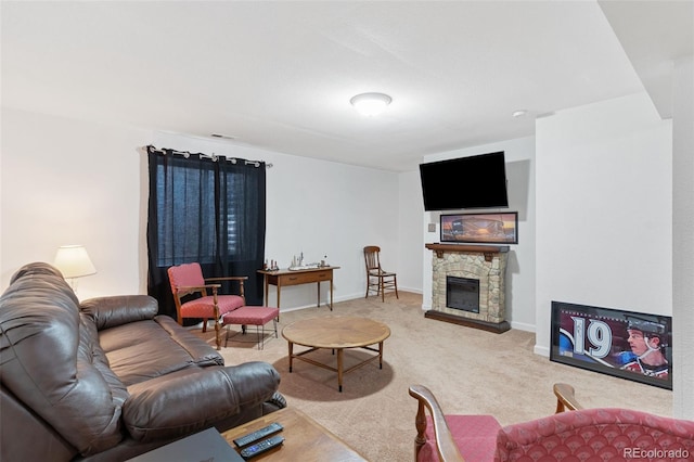 4929 Witches Hollow Ln, Colorado Springs, CO 80911 - carpeted living area with a fireplace and baseboards