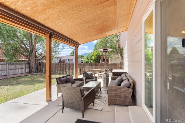 4929 Witches Hollow Ln, Colorado Springs, CO 80911 - fenced backyard featuring an outdoor living space and a patio