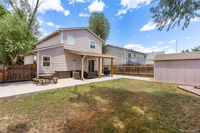 4929 Witches Hollow Ln, Colorado Springs, CO 80911 - back of property with a patio, a fenced backyard, and a storage unit