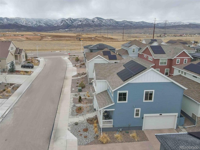 birds eye view of property featuring a residential view and a mountain view