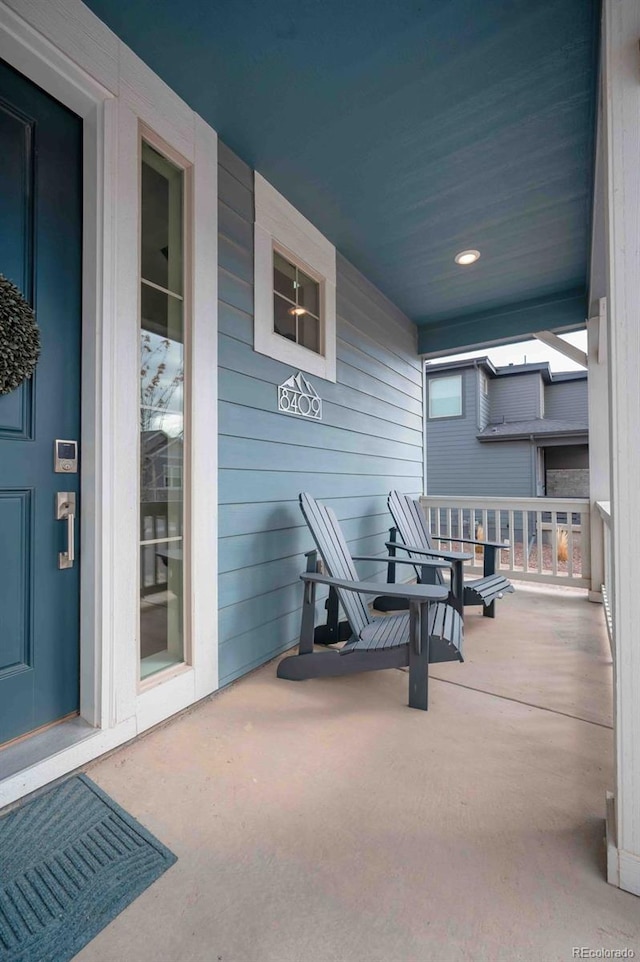 view of patio featuring a porch