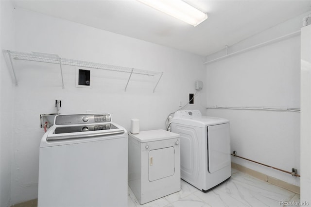 washroom featuring separate washer and dryer