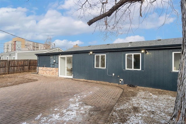 rear view of house with a patio