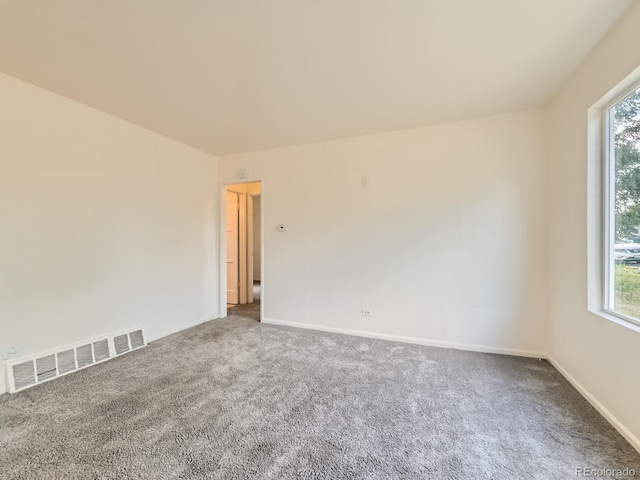 1850 W 50th Ave, Denver, CO 80221 - unfurnished room featuring carpet and healthy amount of natural light