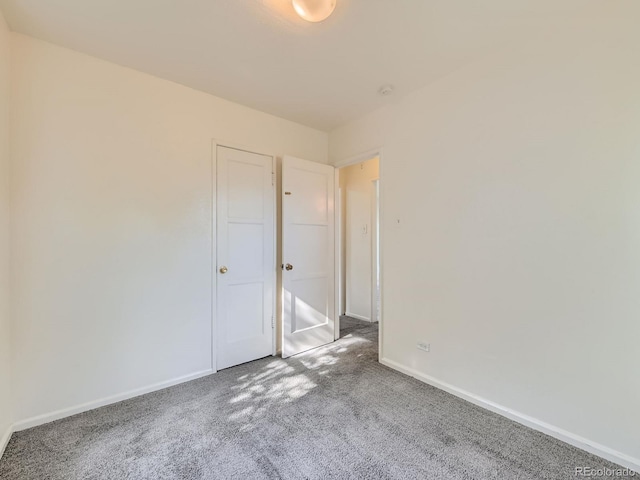 1850 W 50th Ave, Denver, CO 80221 - carpeted spare room with baseboards
