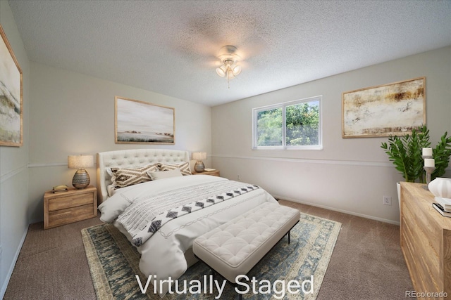 10832 W Powers Pl, Littleton, CO 80127 - carpeted bedroom with a textured ceiling and baseboards