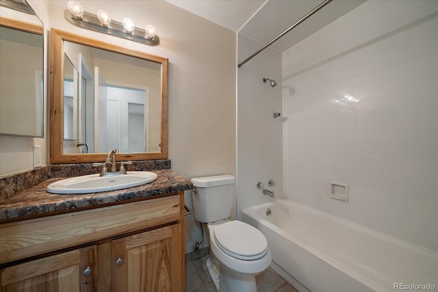 10832 W Powers Pl, Littleton, CO 80127 - full bathroom with toilet, tub / shower combination, vanity, and tile patterned flooring