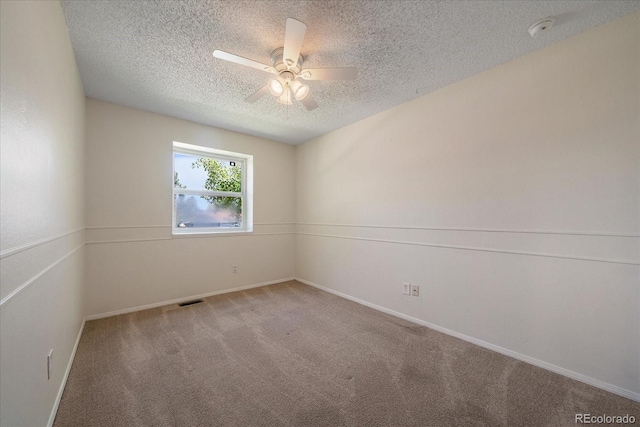 10832 W Powers Pl, Littleton, CO 80127 - empty room featuring a textured ceiling, a ceiling fan, carpet, baseboards, and a smoke detector