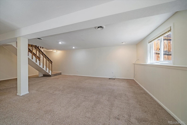 10832 W Powers Pl, Littleton, CO 80127 - below grade area with carpet floors, stairway, and baseboards