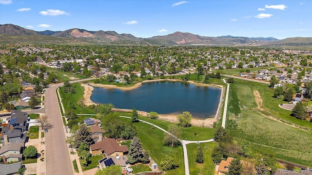 10832 W Powers Pl, Littleton, CO 80127 - aerial overview of property's location with a water and mountain view and nearby suburban area